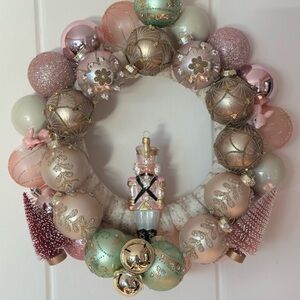 Elegant Holiday Wreath with Gold and Pink Accents